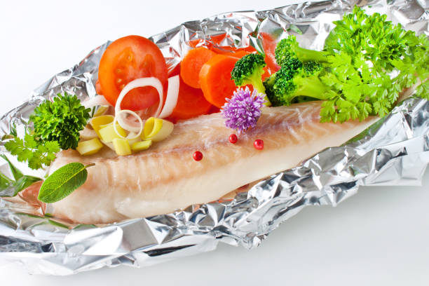 So sánh hai phong cách ướp cá lóc nướng: riềng mẻ và muối ớt.